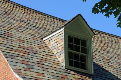 How Natural Slate Roof Installation Compares To Synthetic Slate Roofing